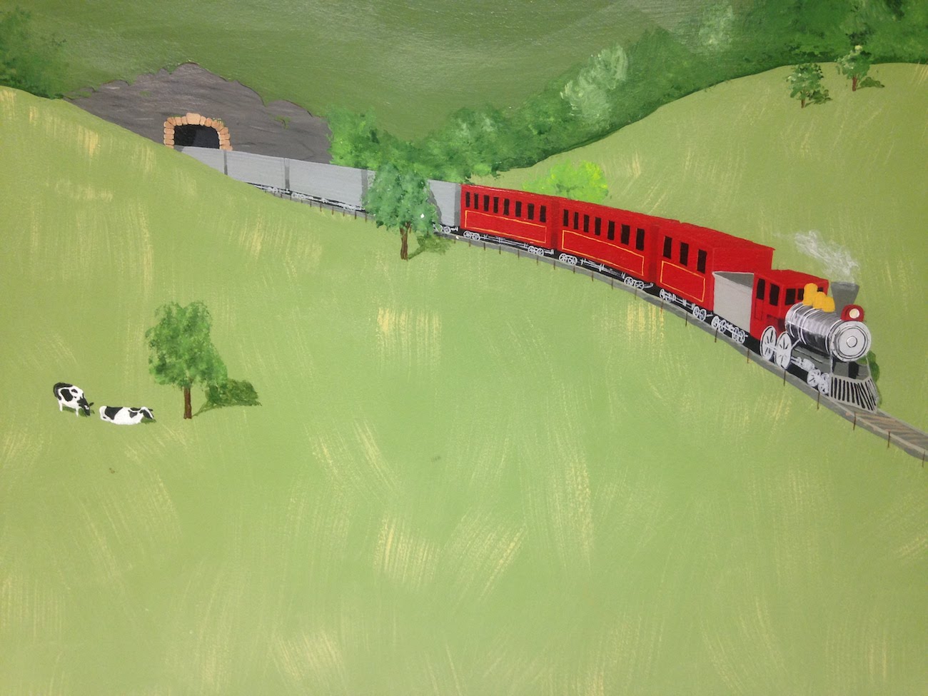 Mural of a red train coming out of a tunnel in a hillside in a field with cows.