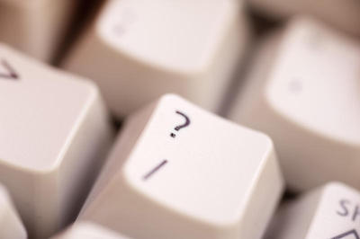 The question mark key on a computer keyboard.